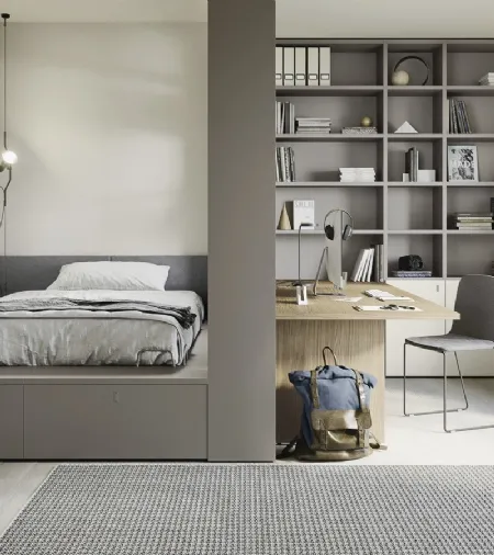 Cameretta componibile con letto su cassettone, scrivania e ampia libreria Next space 02 di Nidi