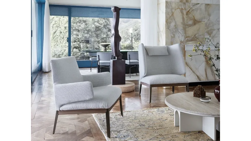 Poltroncine in tessuto Hug Low & High versions di Arflex