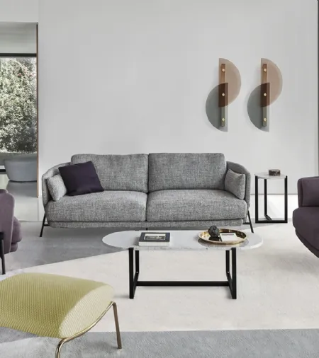 Divano lineare Cradle sofa in tessuto con struttura in metallo di Arflex