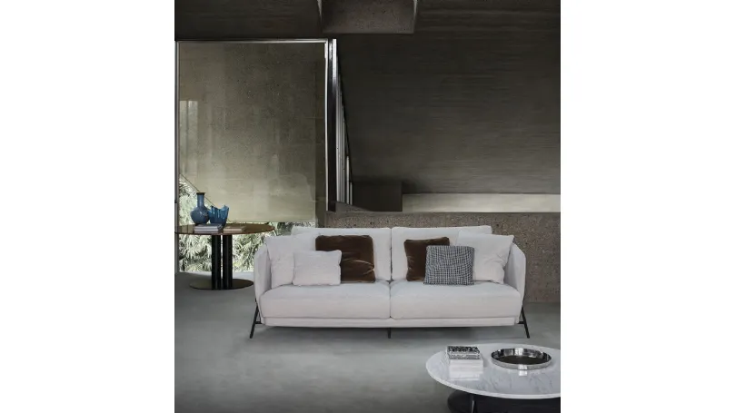 Divano lineare Deep Cradle sofa in tessuto con struttura in metallo di Arflex