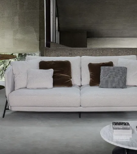 Divano lineare Deep Cradle sofa in tessuto con struttura in metallo di Arflex