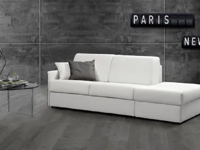 Divano letto lineare in tessuto con pouf Lollò di Excò