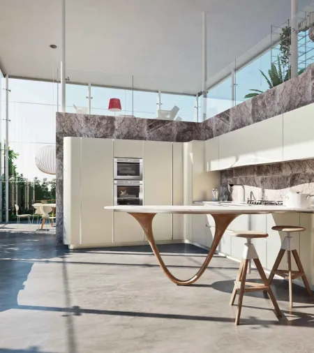 Cucina Design in laccato con penisola caratterizzata da una innovativa gamba curva Ola di Snaidero