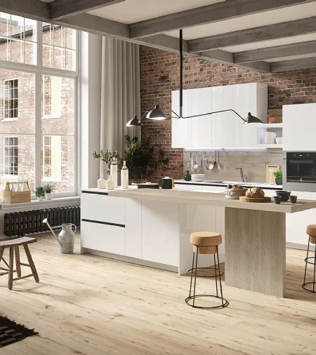 Cucina Design con isola centrale in materico rovere e laccato lucido First di Snaidero